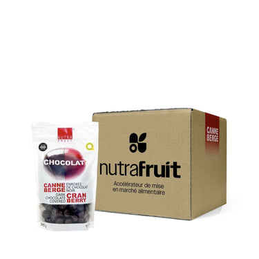 Caisse de canneberge enrobée de chocolat noir par CANNE BERGE. Aliments préparés au Québec par Nutra-Fruit.